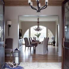 Neutral Rustic Foyer With Black Chandelier