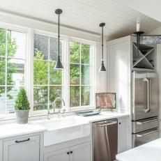 Gray Country Kitchen With Black Pendants