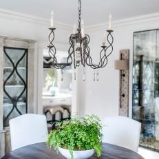 Dining Room With Wrought Iron Chandelier