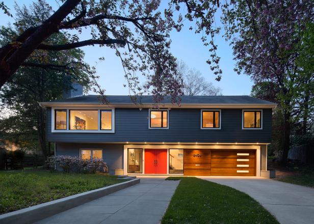 Midcentury Modern Exterior With Blue Siding and Red Front Doors