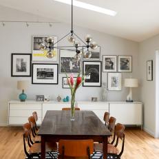 Chic, Midcentury Dining Room With Gallery Wall