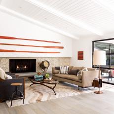 Rowing Oars and Neutral Sofa in Living Room