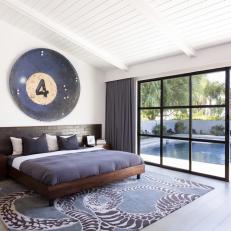 Contemporary Master Bedroom With Sliding Door to Pool Area