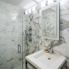 Glass Shower and Granite Walls in Modern Bathroom