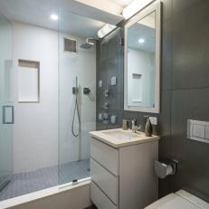 Modern Bathroom With Glass Shower and Single Vanity
