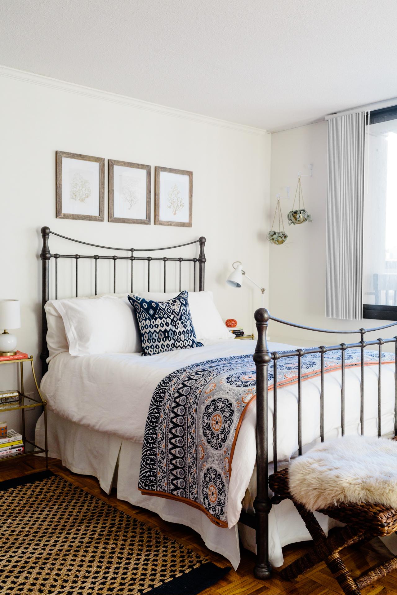 Bedroom With Black Metal Bed And Hanging Plants Hgtv