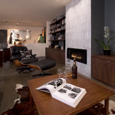 Man Cave With Fireplace and Wood Furnishings