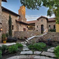 Stunning Mediterranean Home Clad in Stone