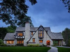 French Country Exterior With Stone Siding and Shingle Roof
