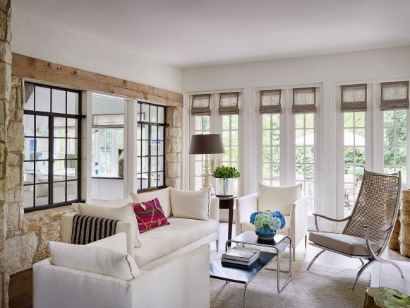 White Transitional Living Room With Stone Wall, White and Neutral Furniture