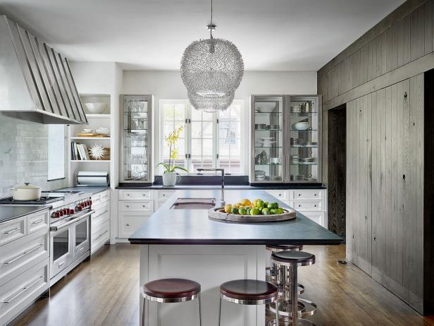 Transitional White Kitchen With White Cabinets, Island & Black Countertops