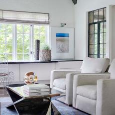 Bright Sunroom With Reflective Coffee Table