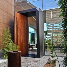 Warm Wood Front Door Entry to Modern Home