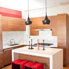 Brown and Red Modern Kitchen With Black Pendants