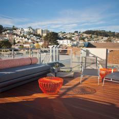 Rooftop Deck With Orange Tables