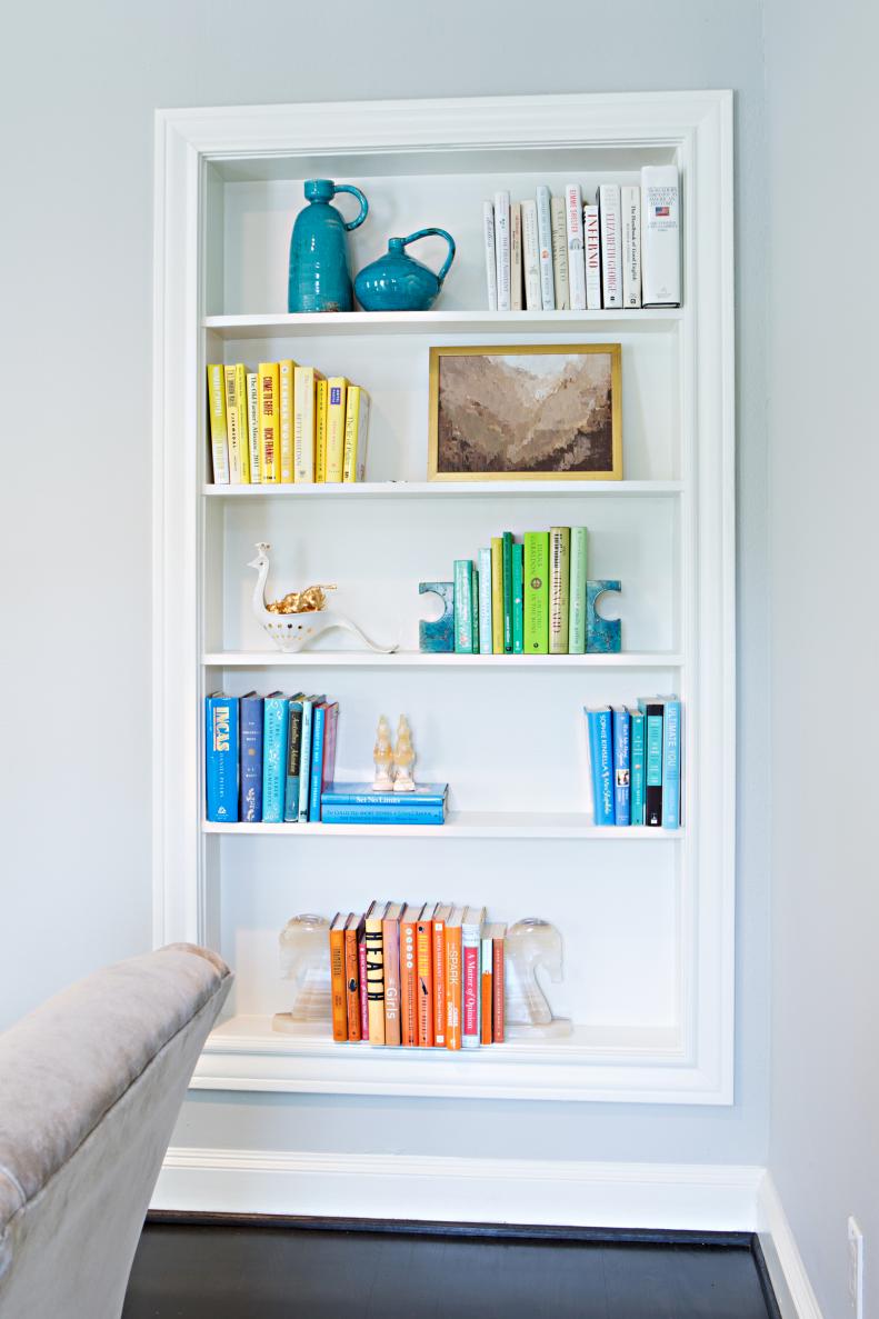 Gray Wall With White Niche Bookshelf & Multicolor Books