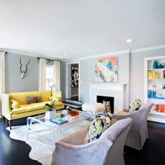 Trendy Gray Family Room With Pops of Color
