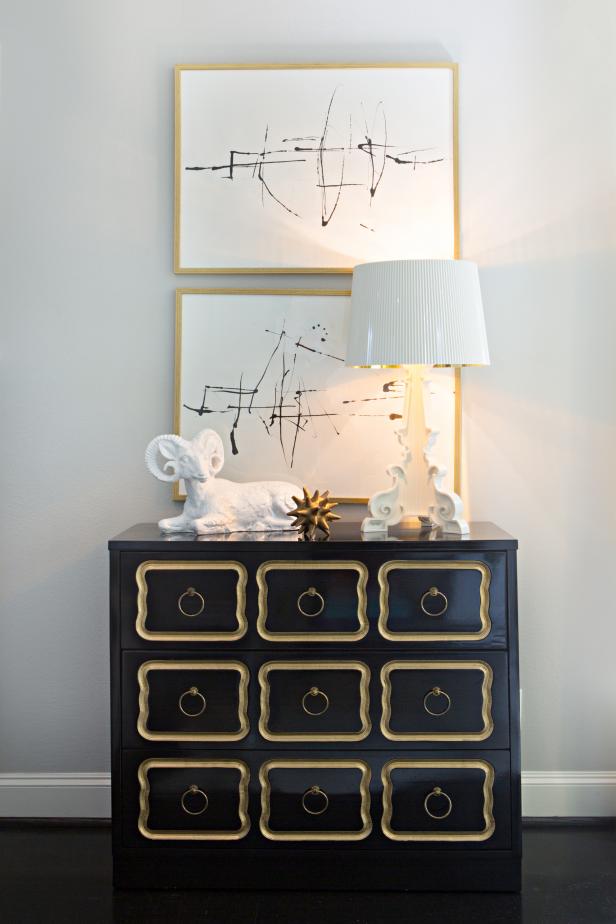 Black and Gold Dresser With White Lamp, Ram Sculpture, Modern Art