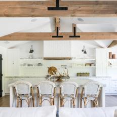 Contemporary Country Kitchen With Exposed Wood Beams, White Brick Wall and Large Eat In Island 