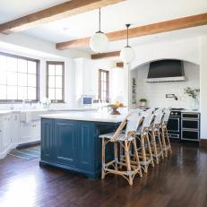 Spacious Transitional Kitchen With Blue Island, Globe Pendant Lights Between Exposed Beams and 