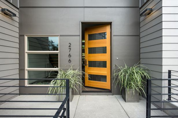 Gray Contemporary Exterior With Light Wood Front Door
