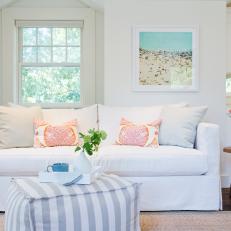 White Cottage Living Room With Striped Ottoman