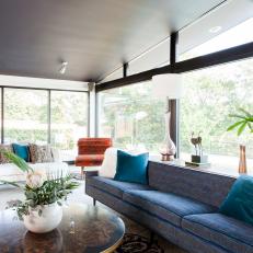 Funky Midcentury Modern Living Room with Cool Textures and Unique Details