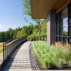 Walkway With Metal Railing and Grasses