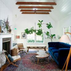 Eclectic Living Room With Blue Velvet Sofa