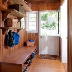 Mudroom With Wood Paneling, Elongated Bench