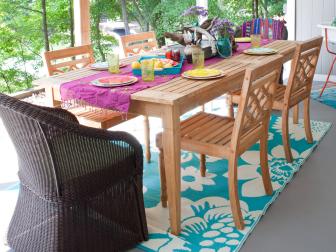 Patio with Colorful Table Setting, Floral Rug and Vintage Drink Cooler