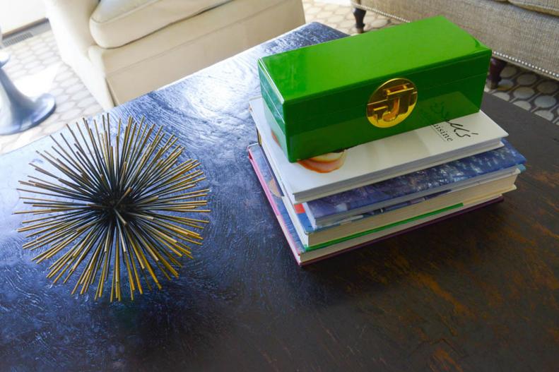 Decorated Coffee Table with Metallic Sculpture, Green Box and Books