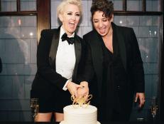 Two Women Cutting Their Wedding Cake