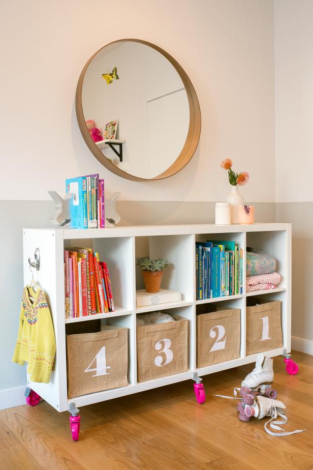 White Cubby Bookshelf With Pink Wheels & Round Mirror