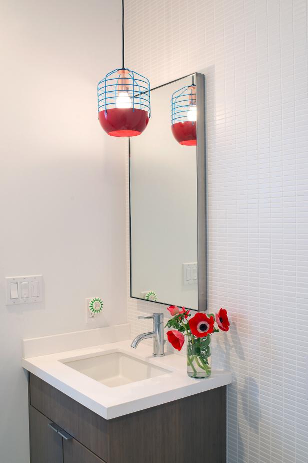 Small Modern White Bathroom With Gray Vanity, Red & Blue Pendant Light