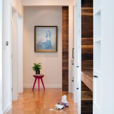 Bright, White Hallway With Light Wood Floor