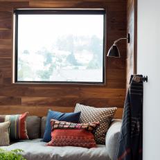 Cushioned Window Seat With Warm Wood Surround