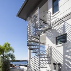 Spiral Staircase Leads to Second Story Balcony