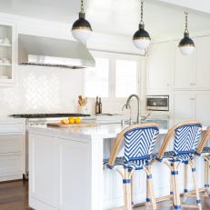 Transitional Kitchen With Woven Blue and White Stools