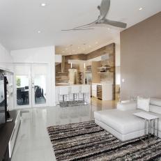 Open Concept Contemporary Living Space With Kitchen Access