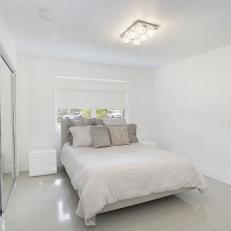 Modern Bedroom With Mirrored Sliding Closet Doors 