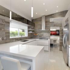 Modern Eat-In Kitchen With White Stone Countertops