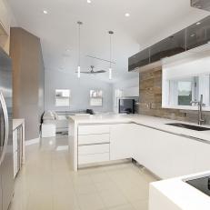 Modern Open Kitchen With Tinted Glass Lift-Up Cabinets