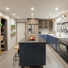 Light and Bright Kitchen With Blue Cabinets and Hanging Storage Baskets