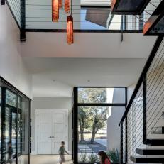 Home's Glass Front, Modern Interior Creates Seamless Indoor-Outdoor Transition
