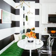Large Black and White Wall Stripes in Contemporary Kitchen Corner With Kelly Green Bench and Small Circular Table