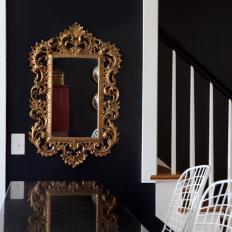 Ornate, Gold Mirror in Black and White Kitchen