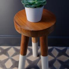 Powder Room Features Succulent Atop Wooden Stool
