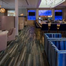 Cobalt Blue Wall and Custom Made Light Fixture Make Bar Space Both Funky and Elegant