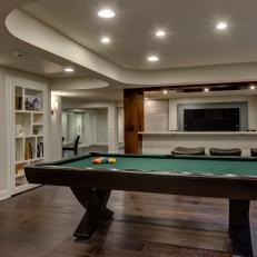Modern Design and Comfortable Flow in Masculine Basement Space